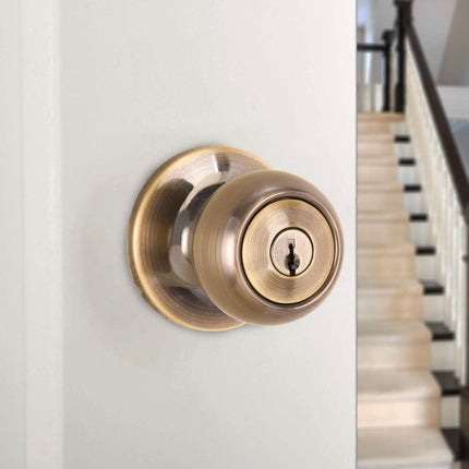 Amazon Basics Exterior Door Knob With Lock, Coastal, Antique Brass